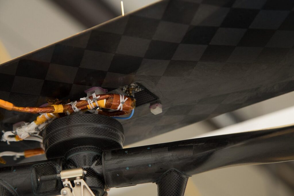 A small piece of fabric from the Wright brothers' 1903 Flyer travelled to Mars under Ingenuity's solar panel.