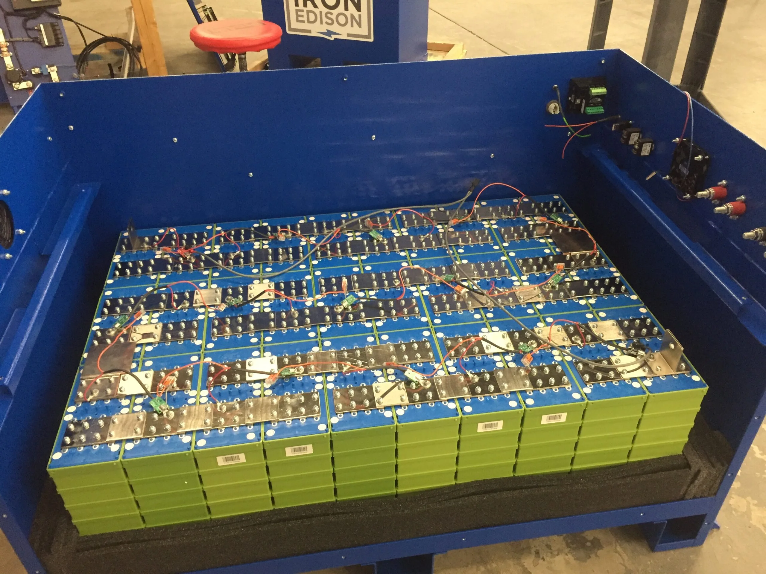 Large LiFePO4 cells wired in series and parallel inside a battery box