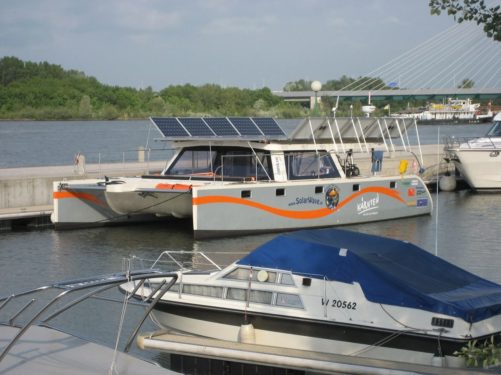 The solar catamaran SolarWave in the marina of Vienna