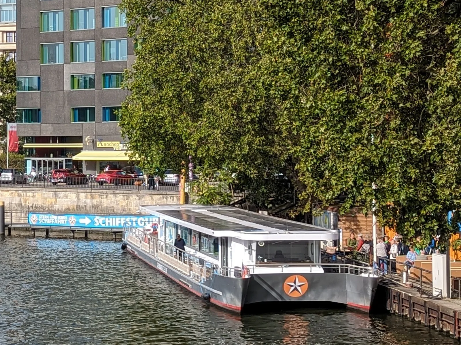 The SunCat 120 solar catamaran moored on the Spree in central Berlin