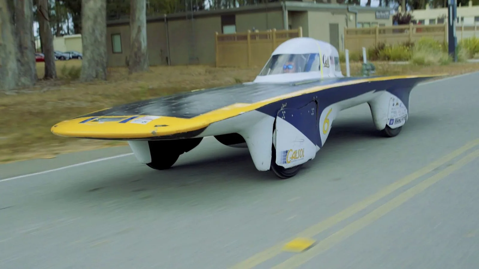 CalSol's solar car Zephyr on the road, rolling shot