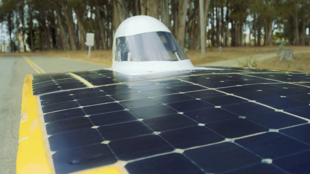 Under the canopy: the driver sits low beneath a small bubble in the solar deck.