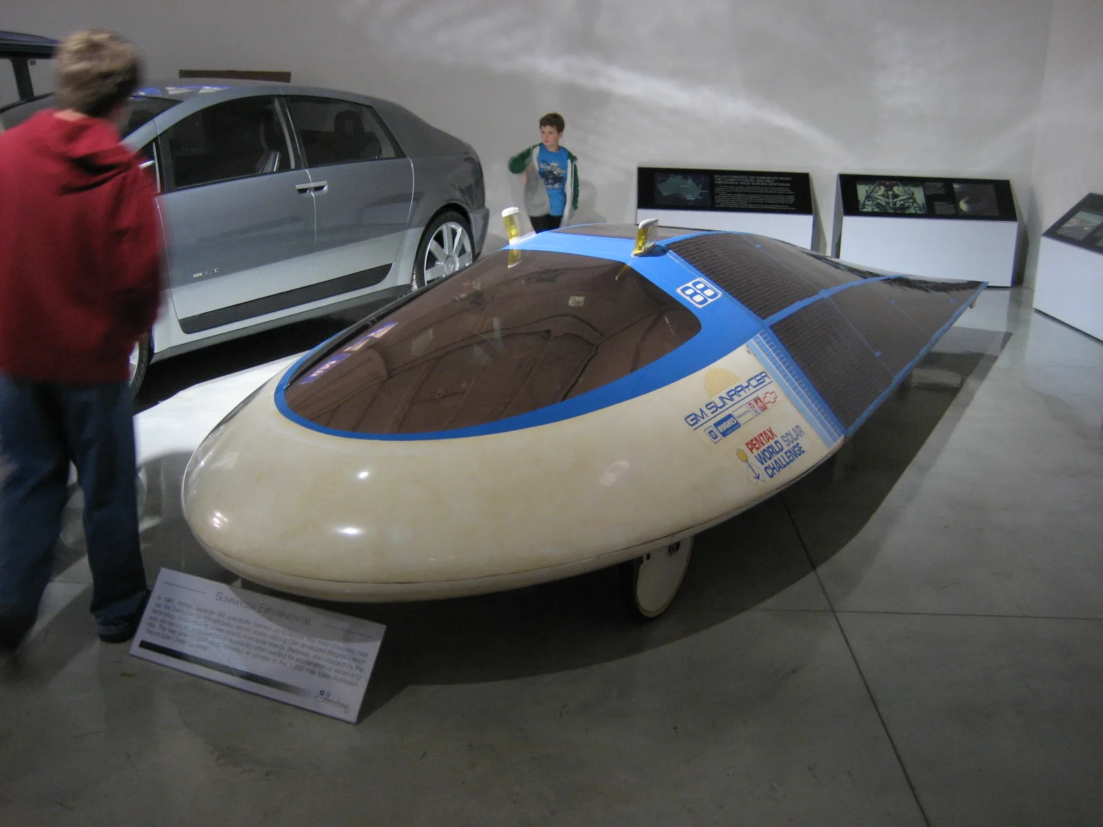 The teardrop-shaped GM Sunraycer solar race car on display at the GM Heritage Center