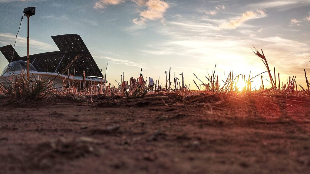 Catching the last rays: the car recharges before sunset in the outback.