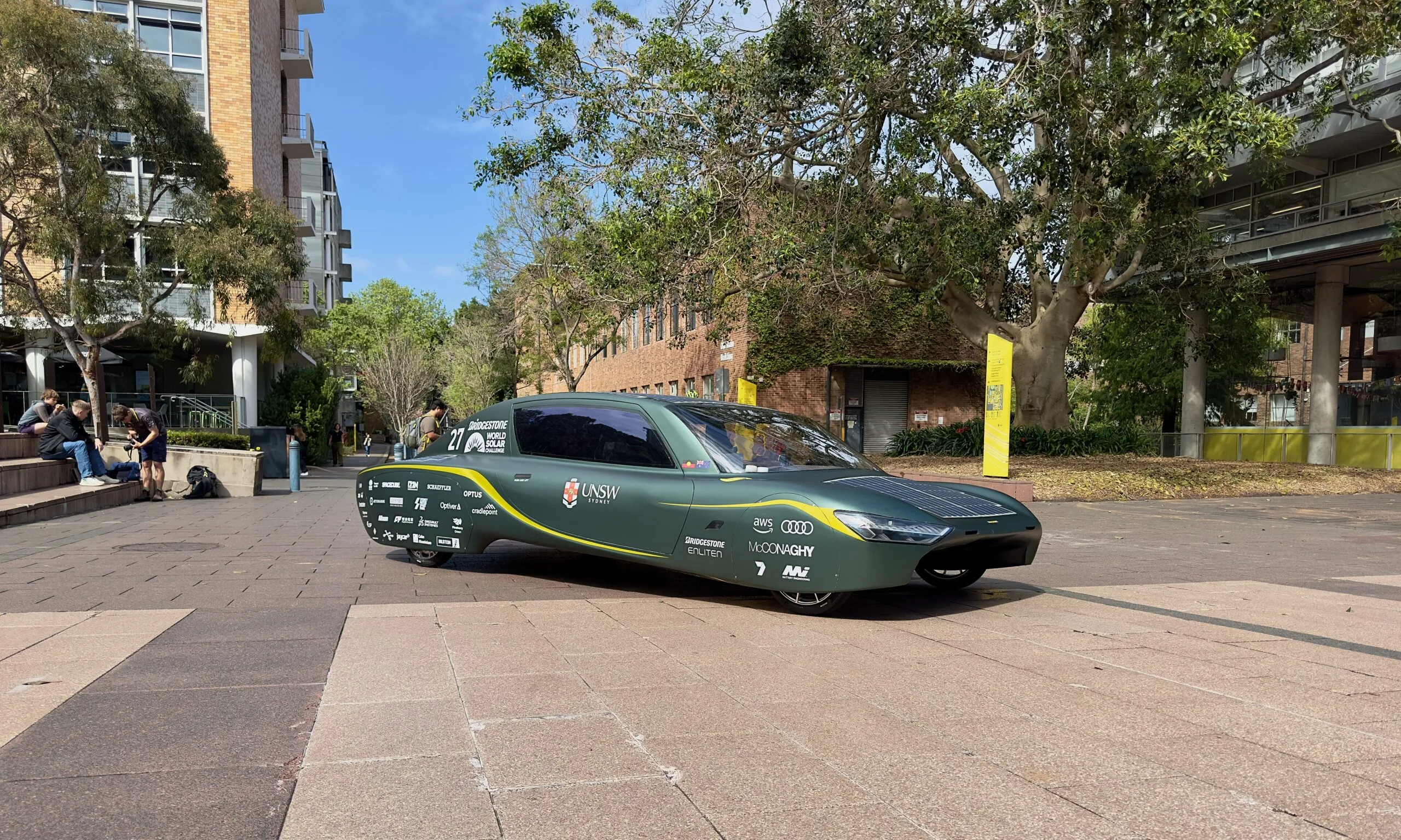 Sunswift 7, a low sleek solar car in race livery