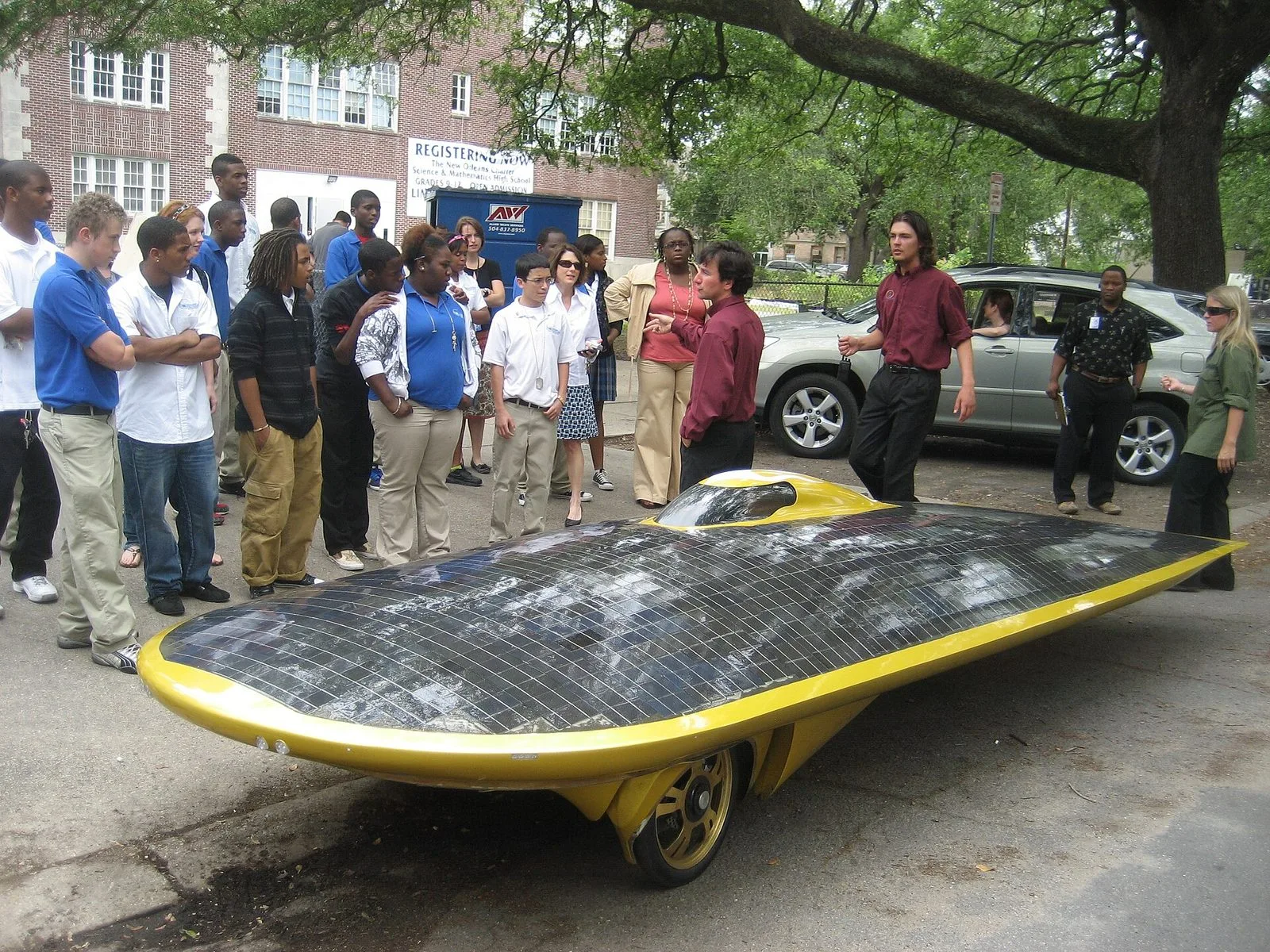 Marcelo da Luz and his solar car XOF1 visiting a school in New Orleans