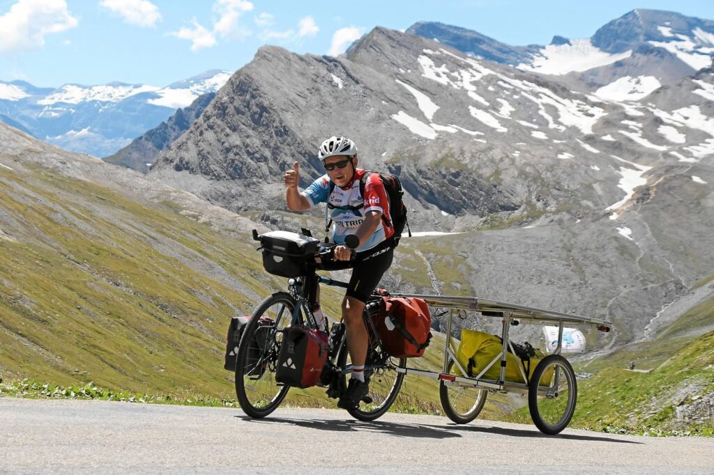 Gilles Andrea – A Surly Travel Bike with a Solar Trailer