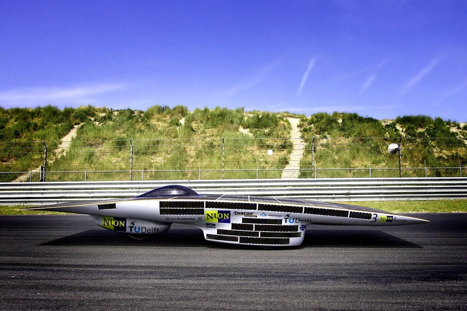 The flat Nuna 3 solar car on the track at Zandvoort