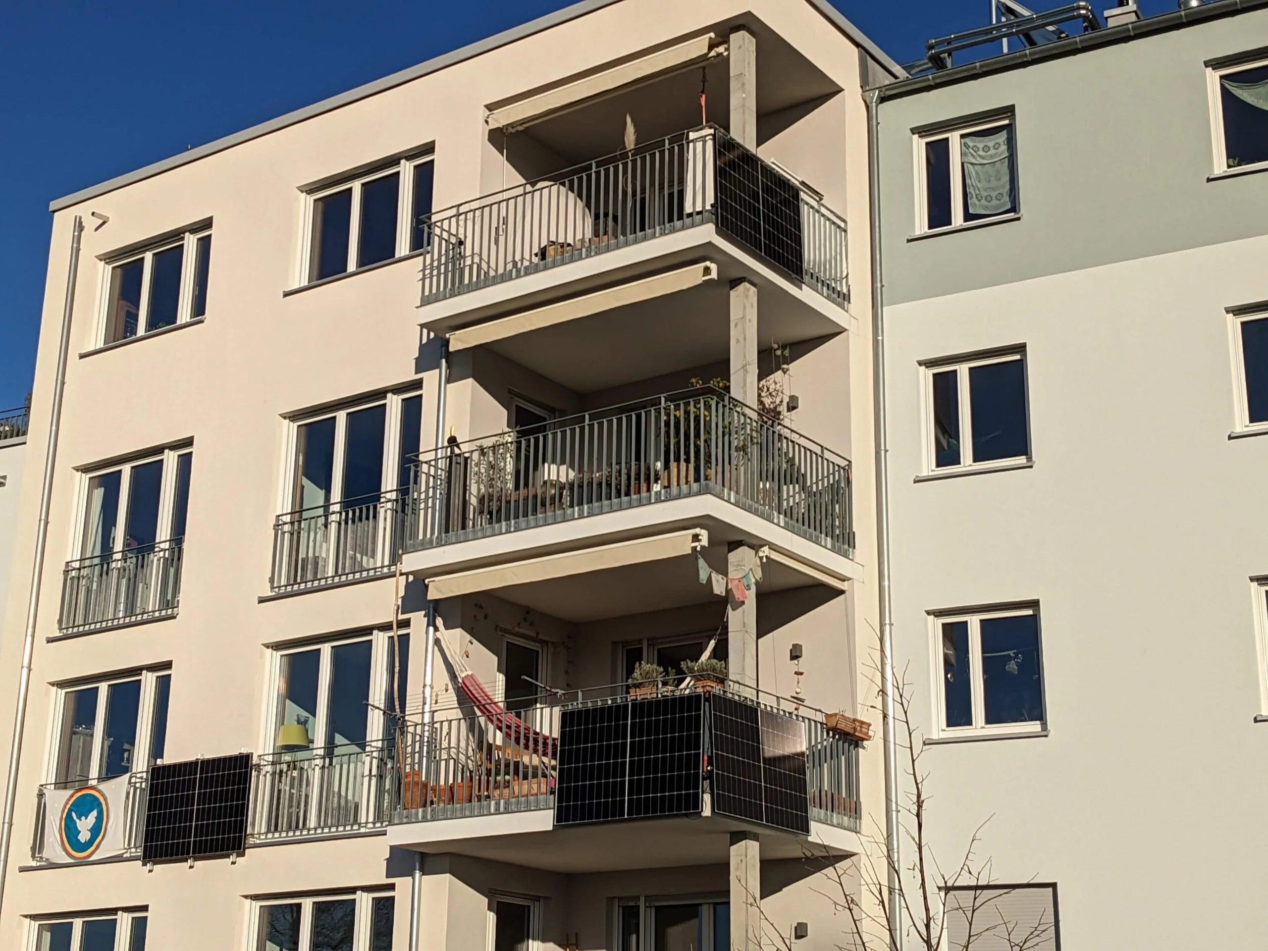 Apartment balconies fitted with plug-in solar panels