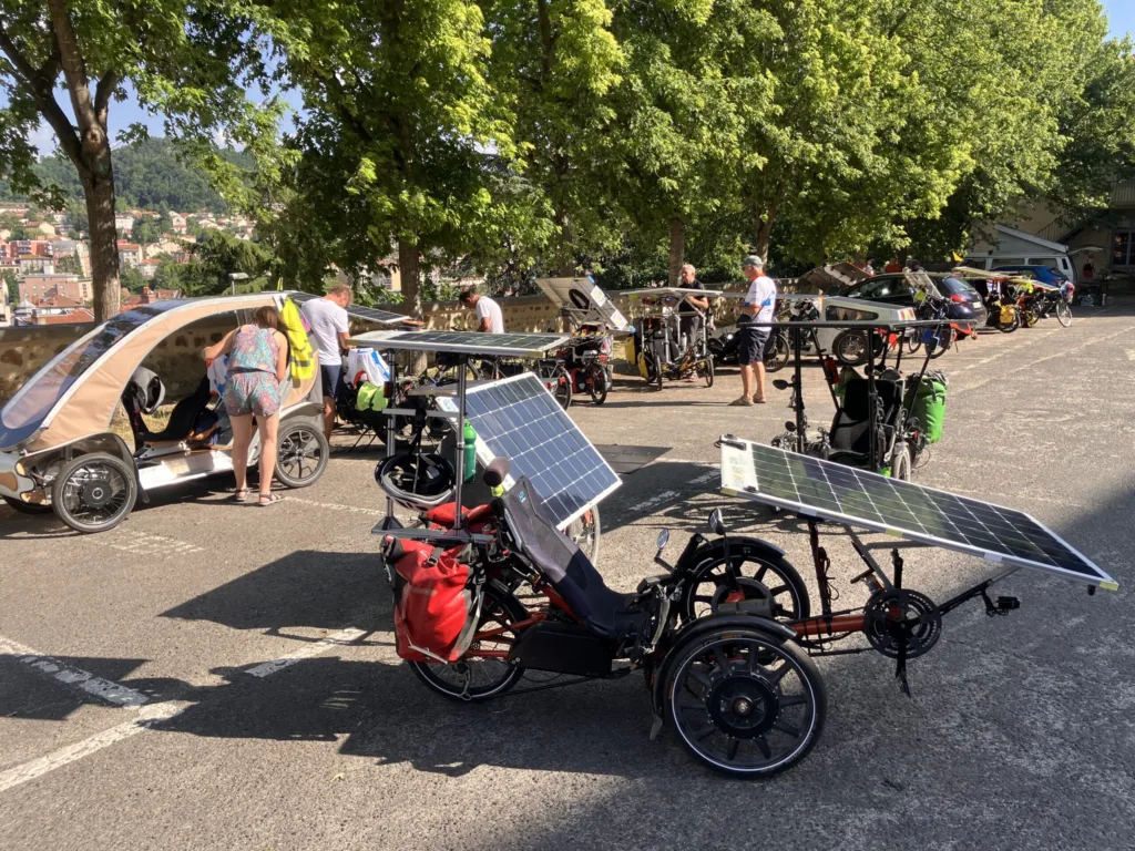 Solar trike with roof-mounted solar panels at the 2026 Auvergne–Rhône-Alpes Sun Trip
